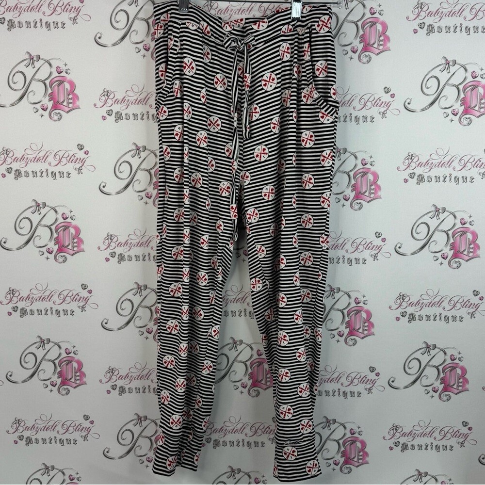 True north pants pj I heart Canada 🇨🇦 Chic Striped Pants with Floral Accents